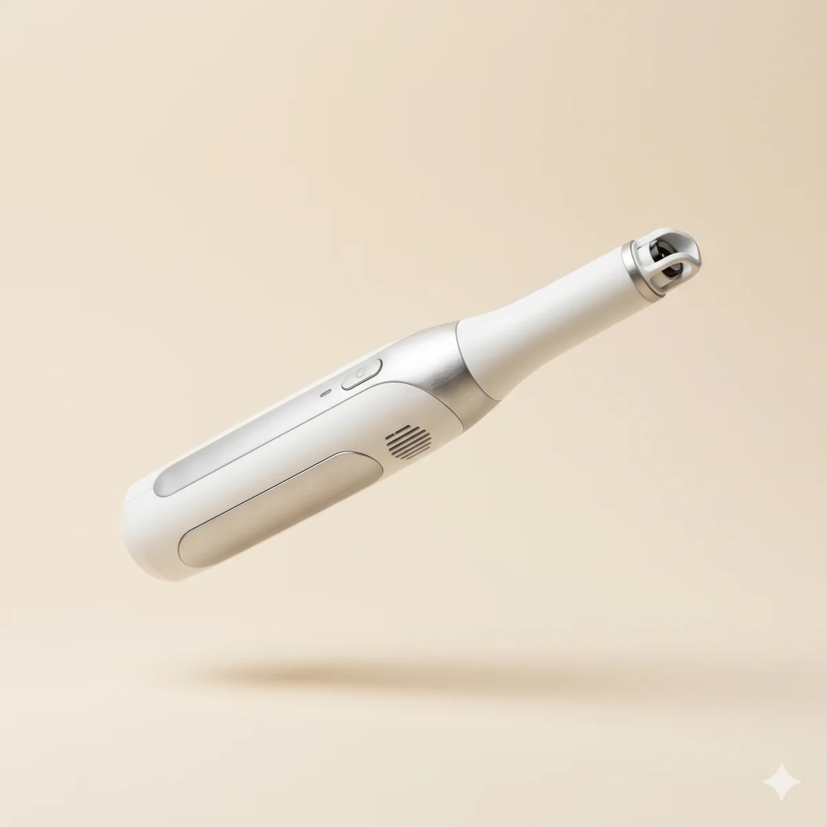 Scanner intraoral alb, fotografiat pe fundal bej cald